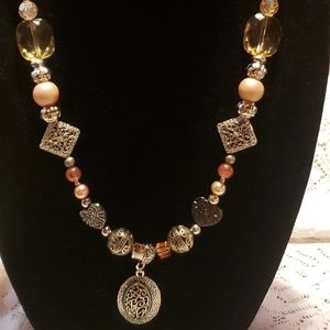 Women's fashion necklace in orange and silver